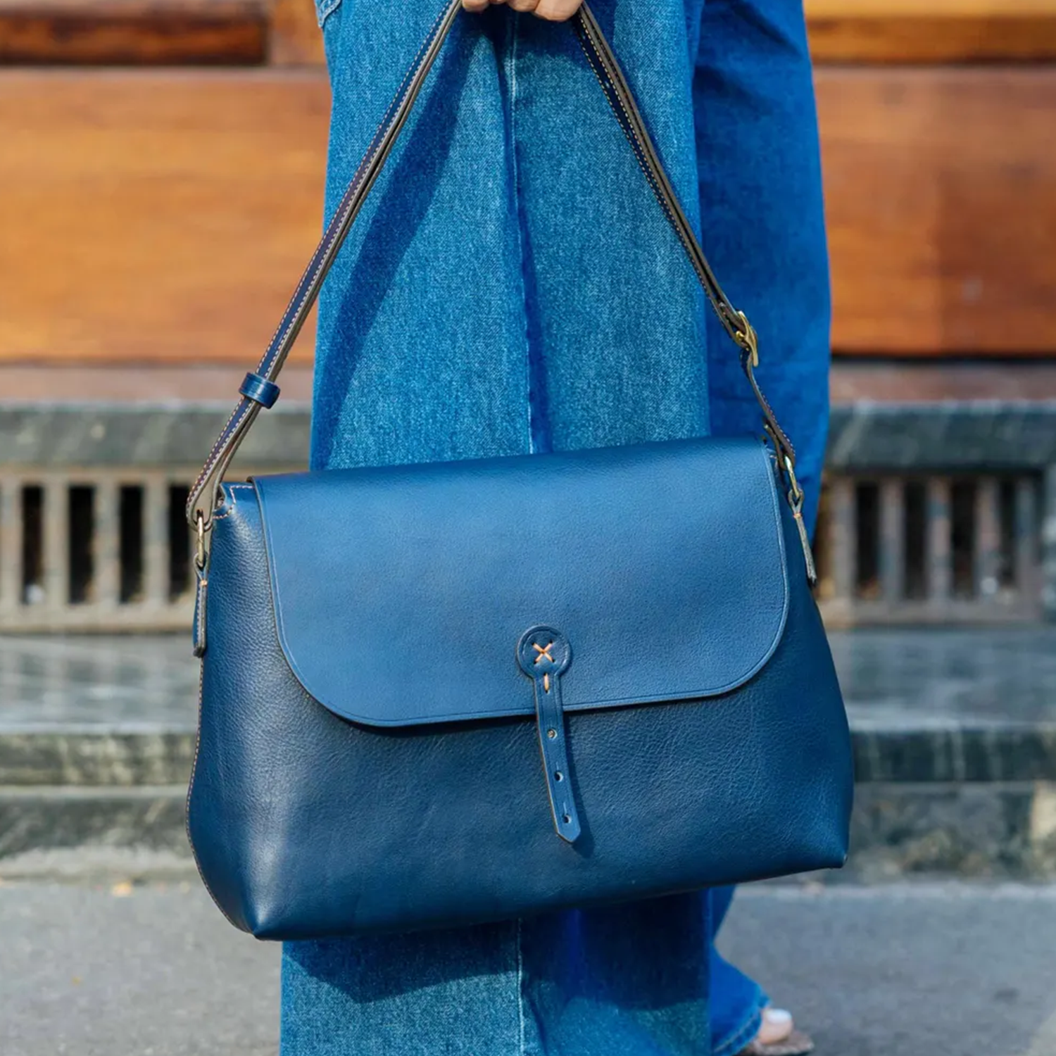 Deep Navy Pebbled Grain Curved Flap Shoulder Satchel With Contrast Edge Stitching, Stitched Circular Tab Fastener And Triple Slot Fabric Lined Interior
