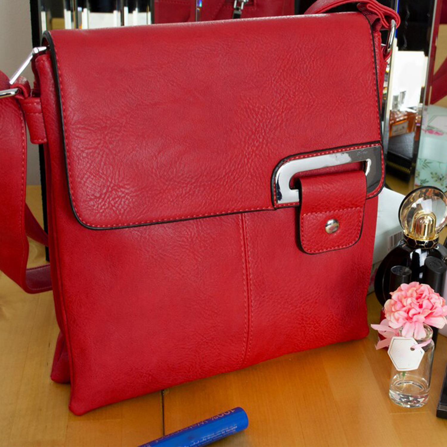 Vibrant Scarlet Pebbled Grain Upright Square Flap Shoulder Carry With Curved Metallic Flap Accent Plate, Rear Full-Width Zip Pocket And Divided Segmented Main Interior