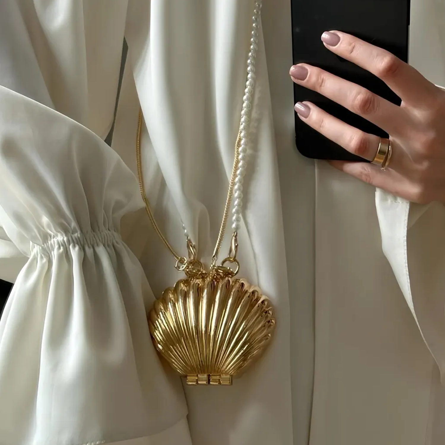 Dual Tone Polished Ribbed Metal Seashell Mini Clutch With Pearl Bead Strand, Slim Metallic Snake Chain And Hidden Magnetic Hinge Closure Wristlet