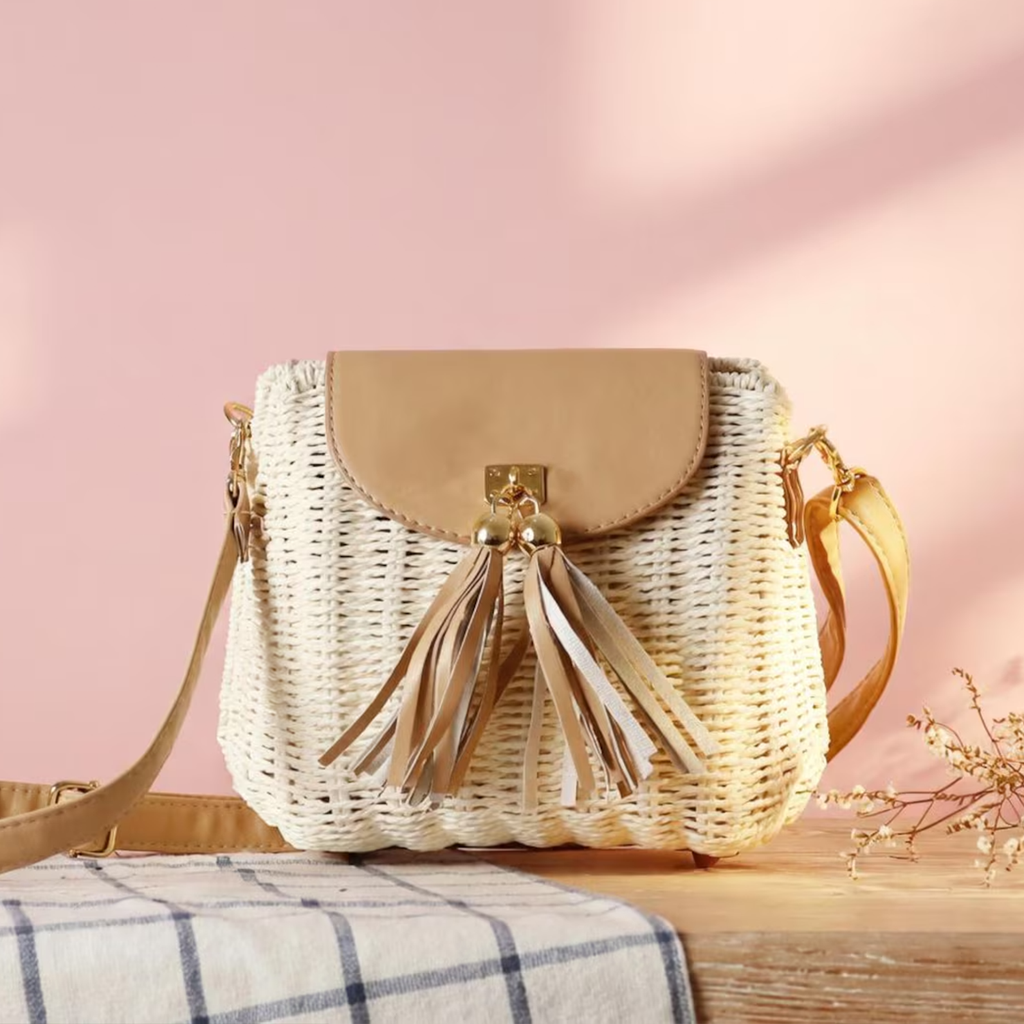 Neutral Woven Straw Compact Square Satchel With Curved Smooth Overlay Flap, Metallic Twist Lock Hardware And Dual Fringe Tassel Accents