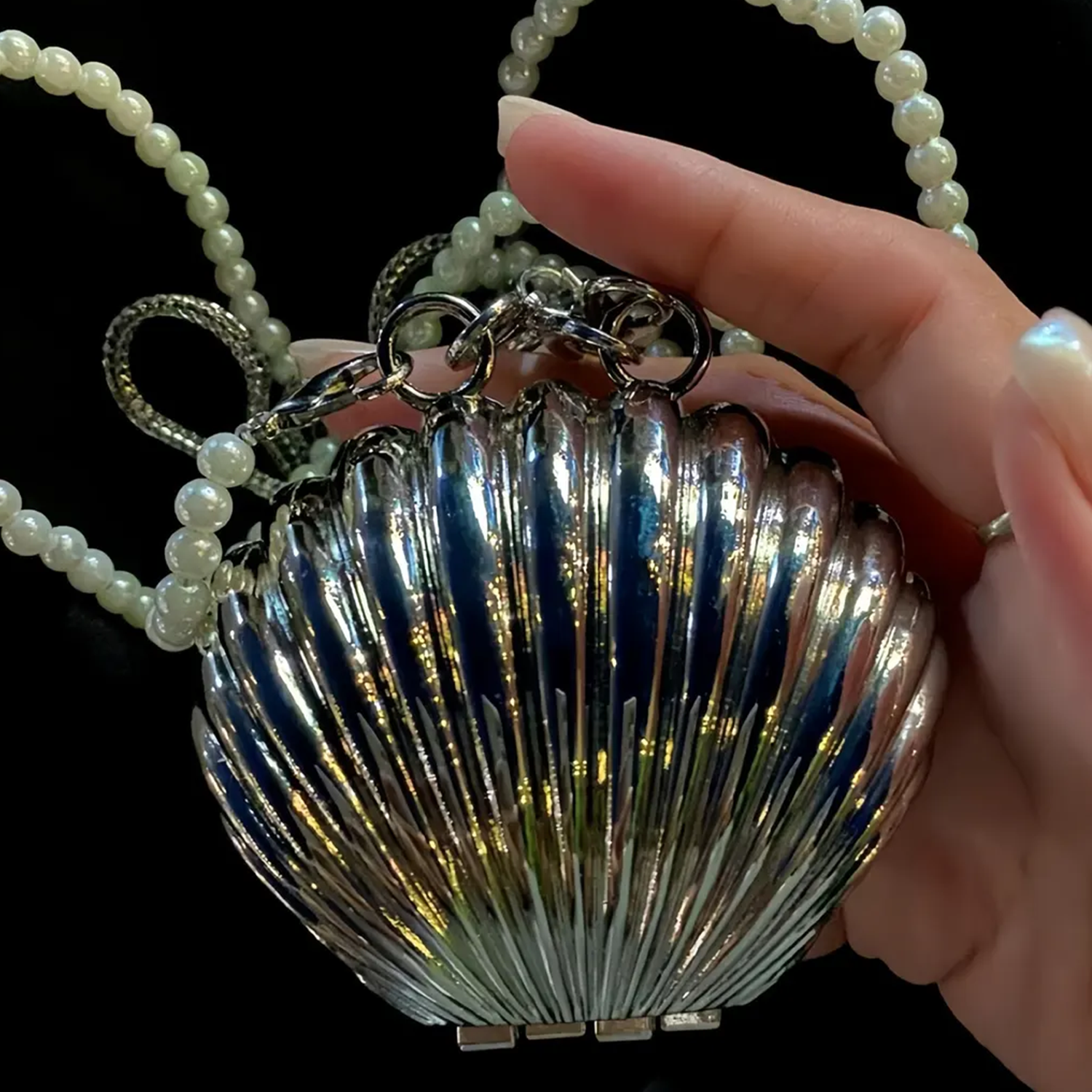 Dual Tone Polished Ribbed Metal Seashell Mini Clutch With Pearl Bead Strand, Slim Metallic Snake Chain And Hidden Magnetic Hinge Closure Wristlet